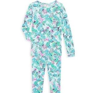 A botanical print with illustrated dogs & kitties. 95% cotton/5% spandex.